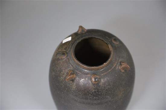 A Chinese Henan dark brown glazed jar, Song-Yuan dynasty, H. 23cm